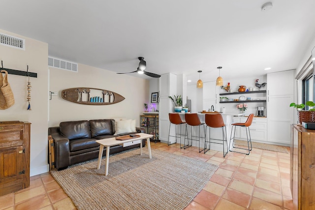 living room with ceiling fan