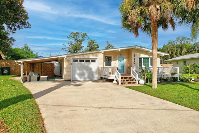 ranch-style house with a front yard and a carport