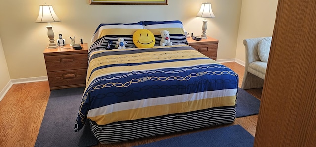 bedroom featuring baseboards
