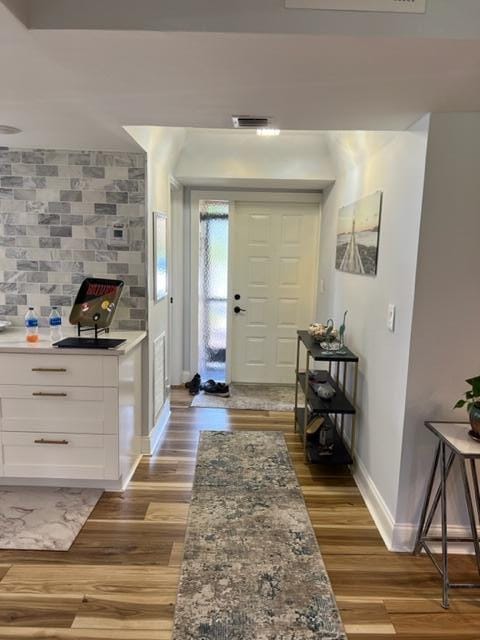 foyer featuring hardwood / wood-style flooring