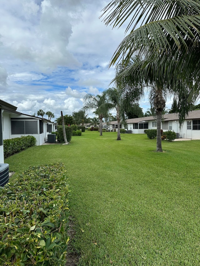 view of yard featuring central AC