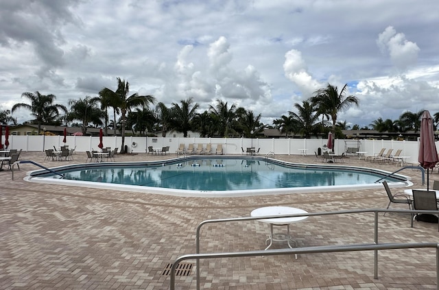 view of swimming pool with a patio area