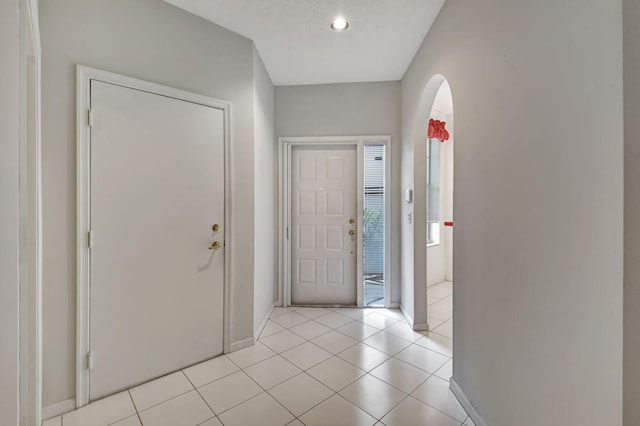 view of tiled foyer entrance