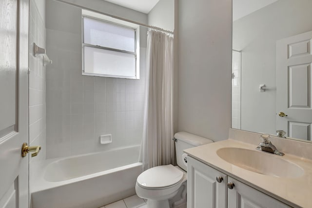 full bathroom featuring tile patterned flooring, shower / tub combo, vanity, and toilet