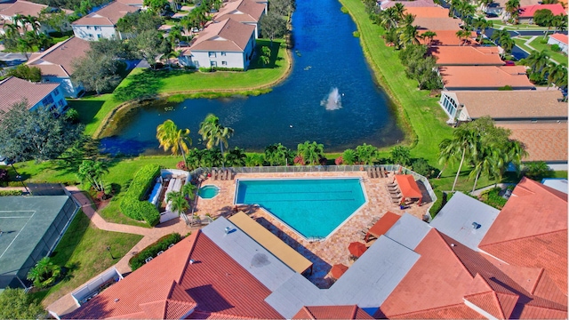 birds eye view of property featuring a water view