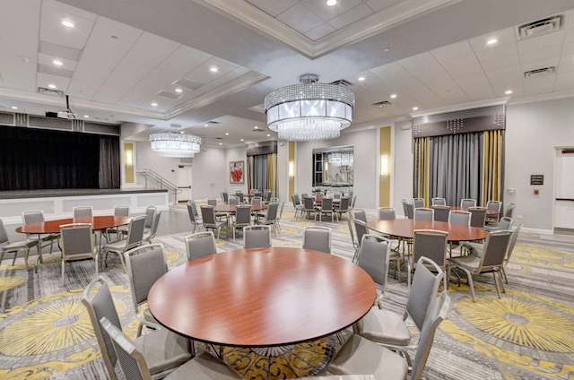 dining space with crown molding and an inviting chandelier