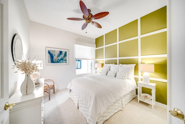 bedroom with ceiling fan and carpet flooring