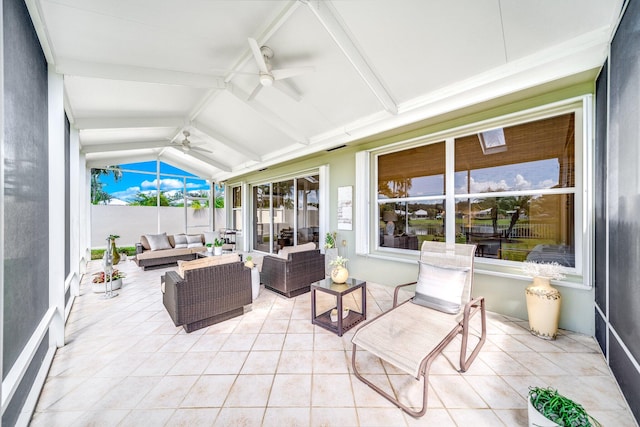 sunroom / solarium featuring vaulted ceiling and ceiling fan