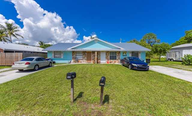 ranch-style house with a front lawn