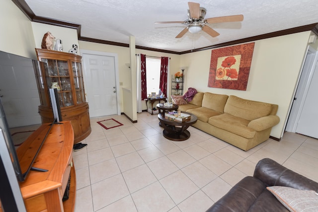 tiled living room with a textured ceiling, ceiling fan, and crown molding