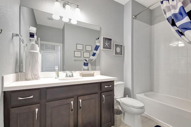 full bathroom featuring shower / tub combo, tile patterned flooring, vanity, and toilet