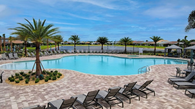 view of swimming pool featuring a gazebo and a patio area