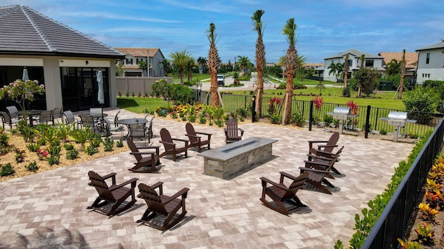 view of patio / terrace with a fire pit