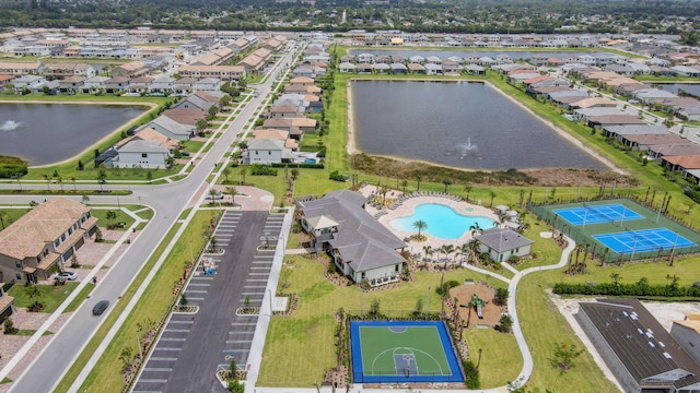 bird's eye view with a water view