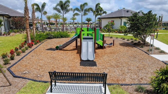 view of jungle gym featuring a yard