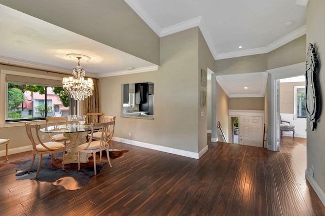 dining area featuring dark hardwood / wood-style floors and crown molding