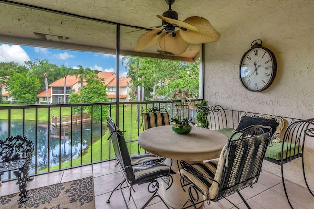 exterior space with ceiling fan