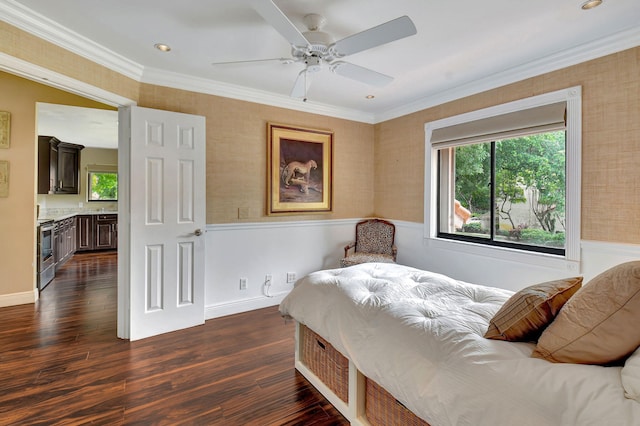 bedroom featuring ceiling fan, dark hardwood / wood-style floors, and crown molding