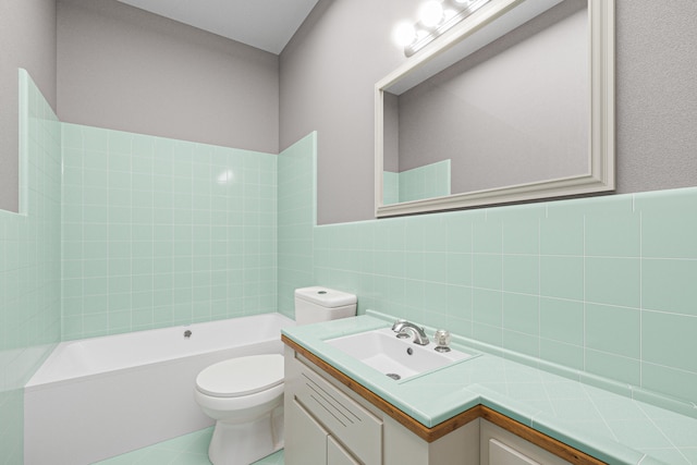 bathroom featuring tile walls, toilet, and vanity