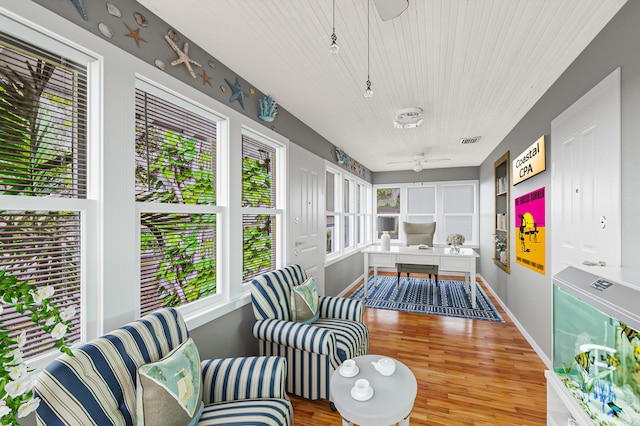 sunroom featuring a wealth of natural light