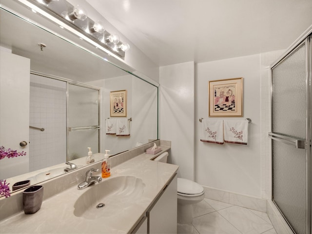 bathroom with vanity, toilet, tile patterned floors, and an enclosed shower