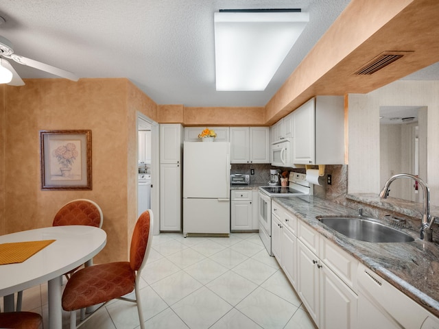 7380 S Oriole Blvd Unit 507N, Delray Beach, FL 33446 - kitchen featuring white appliances, a sink, white cabinetry, ceiling fan, and stone countertops