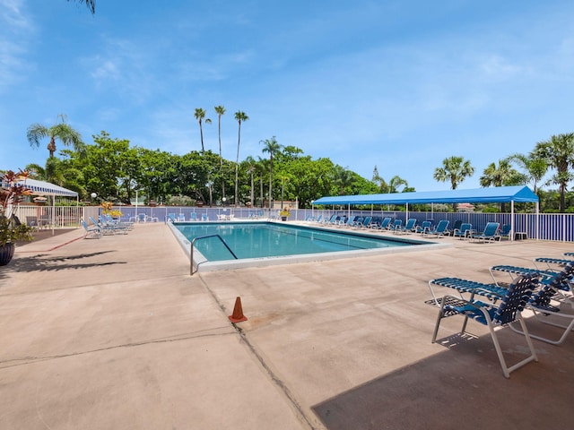 view of swimming pool featuring a patio