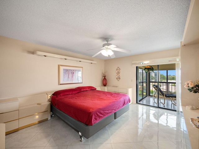 bedroom with access to outside, a textured ceiling, light tile patterned flooring, and ceiling fan