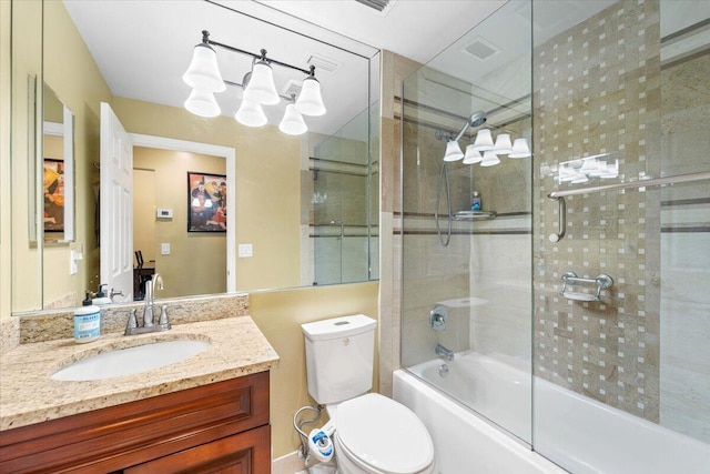 full bathroom featuring shower / bath combination with glass door, vanity, and toilet