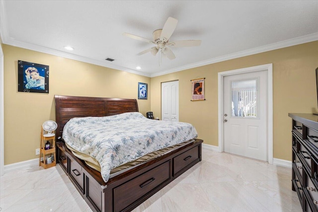 bedroom with ceiling fan, a closet, and crown molding