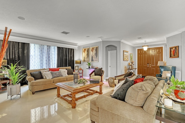 living room featuring crown molding