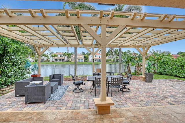 view of patio featuring a water view and a pergola