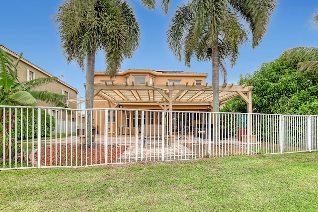 exterior space featuring a pergola, a patio, and a front yard