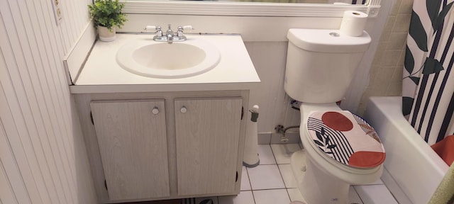 full bathroom with tile patterned floors, vanity, and toilet