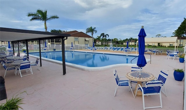 105 Lake Pine Cir Unit B-1, Greenacres, FL 33463 - community pool with a patio area