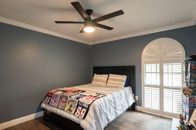 bedroom with ornamental molding, hardwood / wood-style floors, and ceiling fan