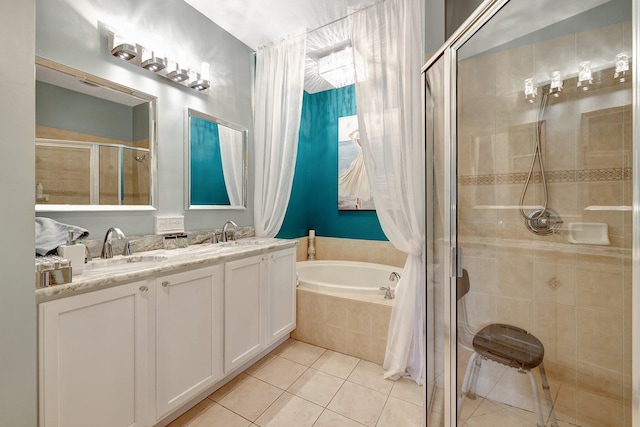 bathroom with vanity, shower with separate bathtub, and tile patterned flooring