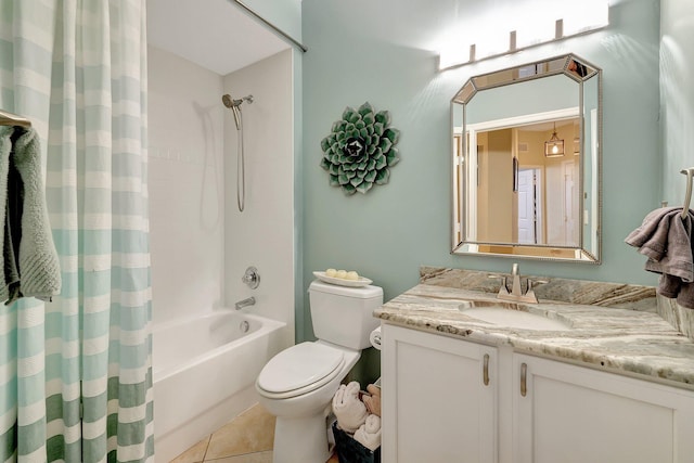 full bathroom with shower / bath combo with shower curtain, tile patterned floors, vanity, and toilet