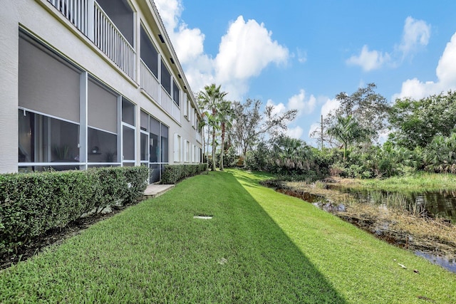 view of yard featuring a water view