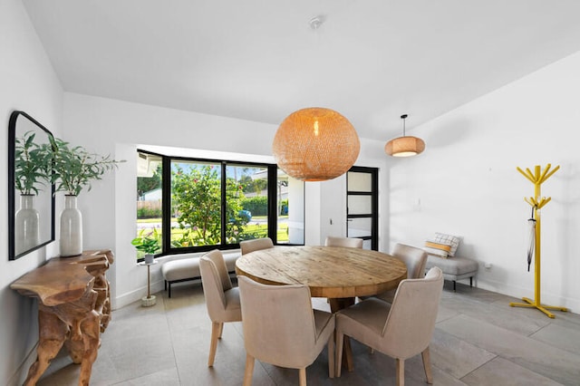 dining room featuring light tile patterned floors