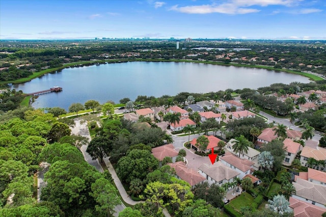 drone / aerial view with a water view