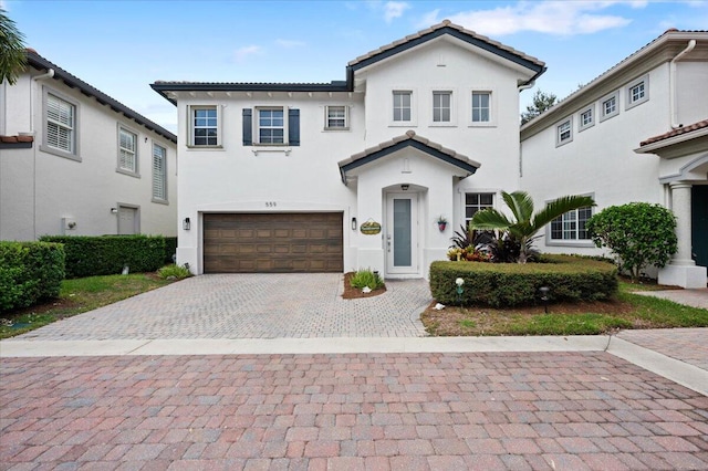 view of front of property with a garage