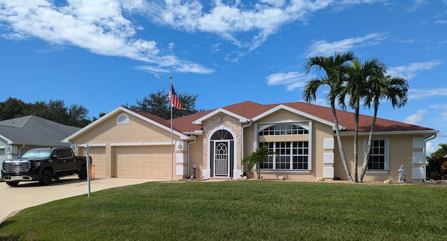 single story home featuring a front yard and a garage