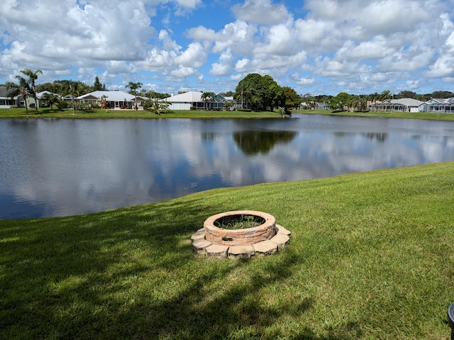 water view with a fire pit