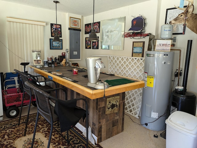 bar featuring water heater, pendant lighting, and a textured ceiling