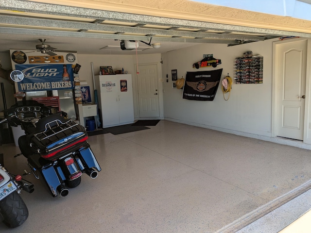 garage featuring a garage door opener