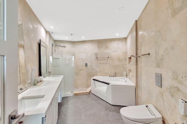 full bath featuring a garden tub, toilet, tile walls, double vanity, and tiled shower