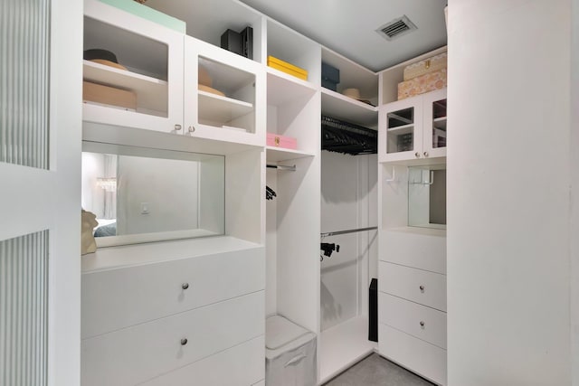 walk in closet with visible vents