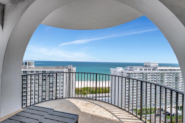 balcony with a city view and a water view