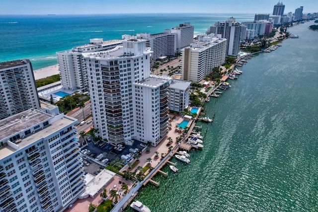 aerial view featuring a view of city and a water view